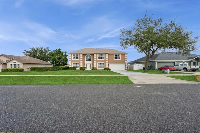 a view of road with house in background