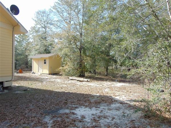 63 East Michaelangelo Road DeFuniak Springs, FL 32433 - Photo 27 of 29 Yard - Back