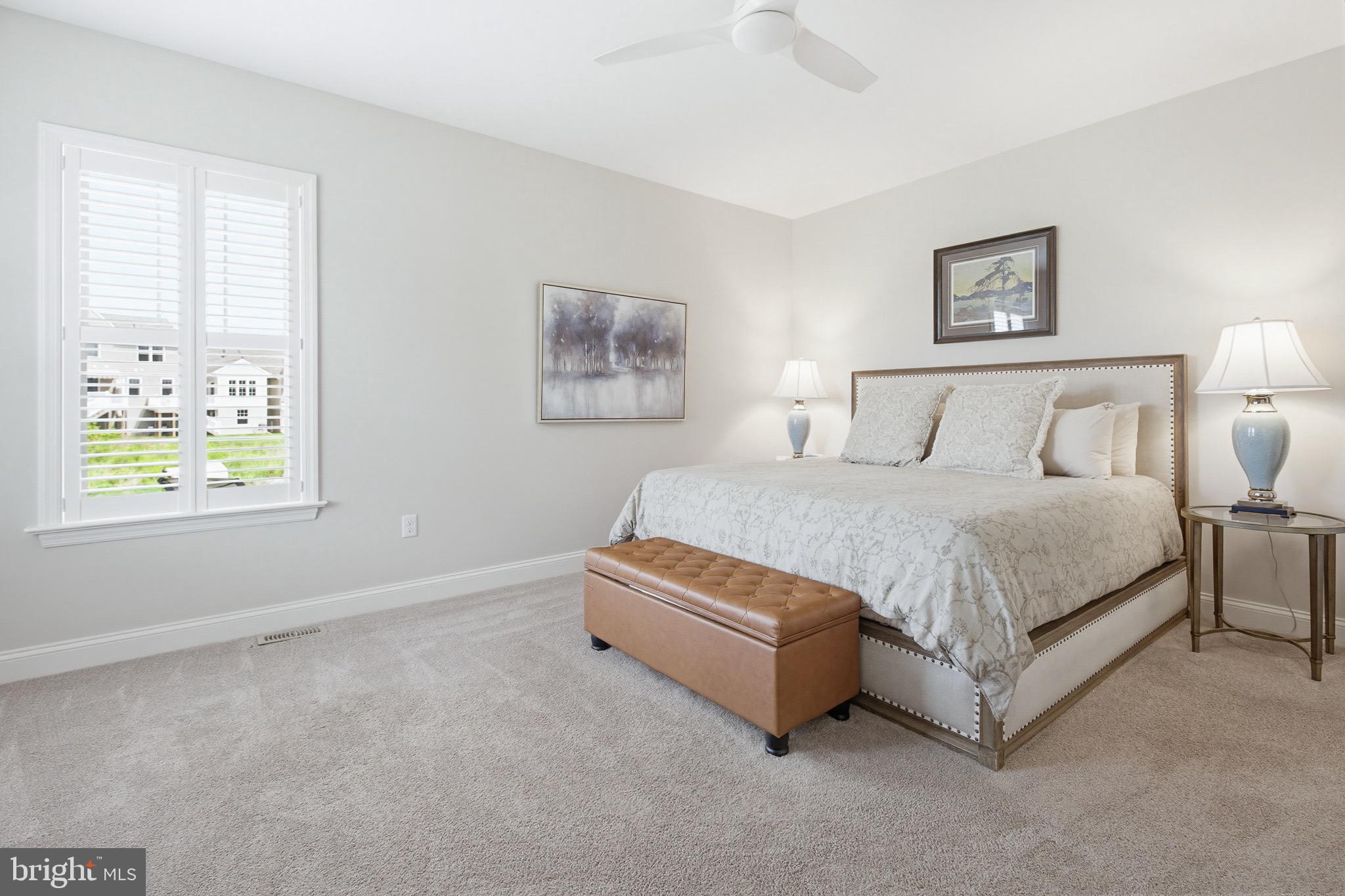 361 Meadow Rose Drive Lititz, PA 17543 - Photo 19 of 39 a spacious bedroom with a bed and a window