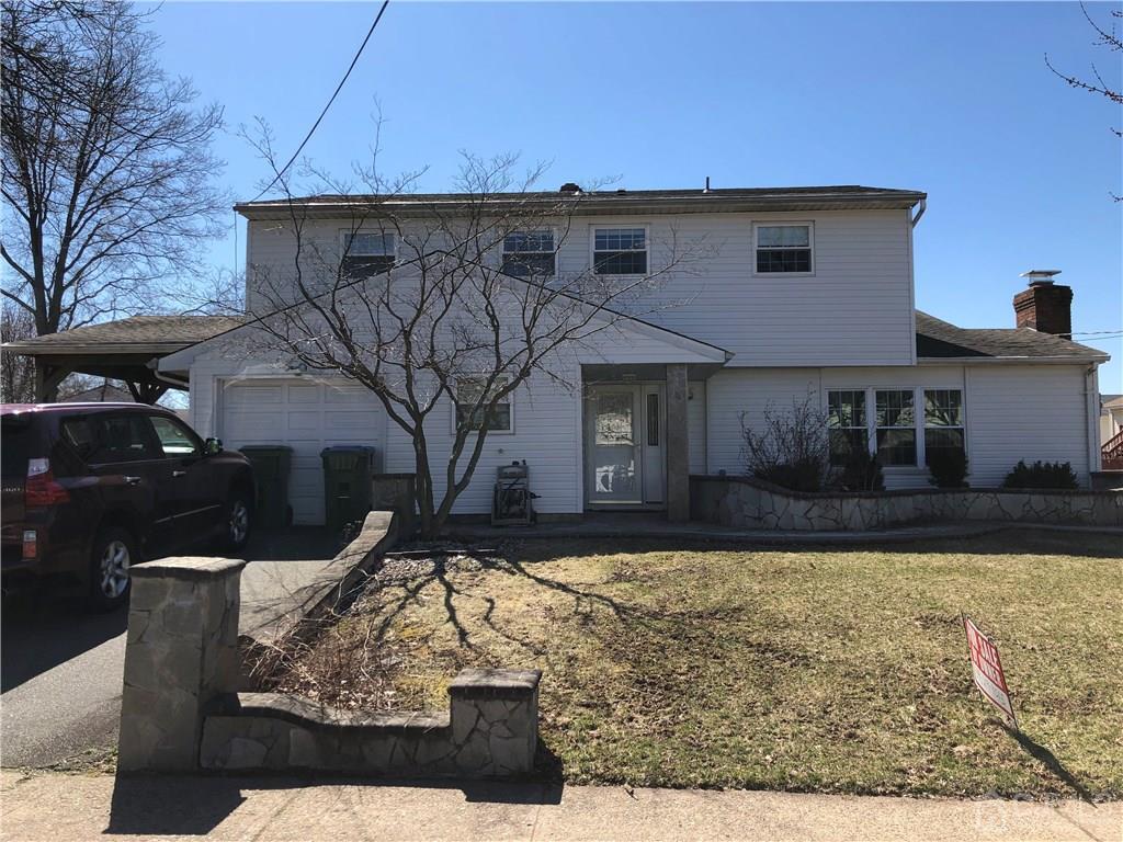 36 Partch Place Edison, NJ 08817 - Photo 1 of 24 a view of a house with a yard
