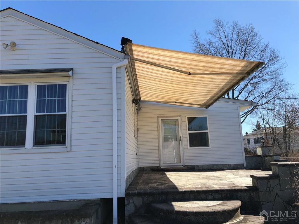 36 Partch Place Edison, NJ 08817 - Photo 21 of 24 a view of a patio with chair and tables