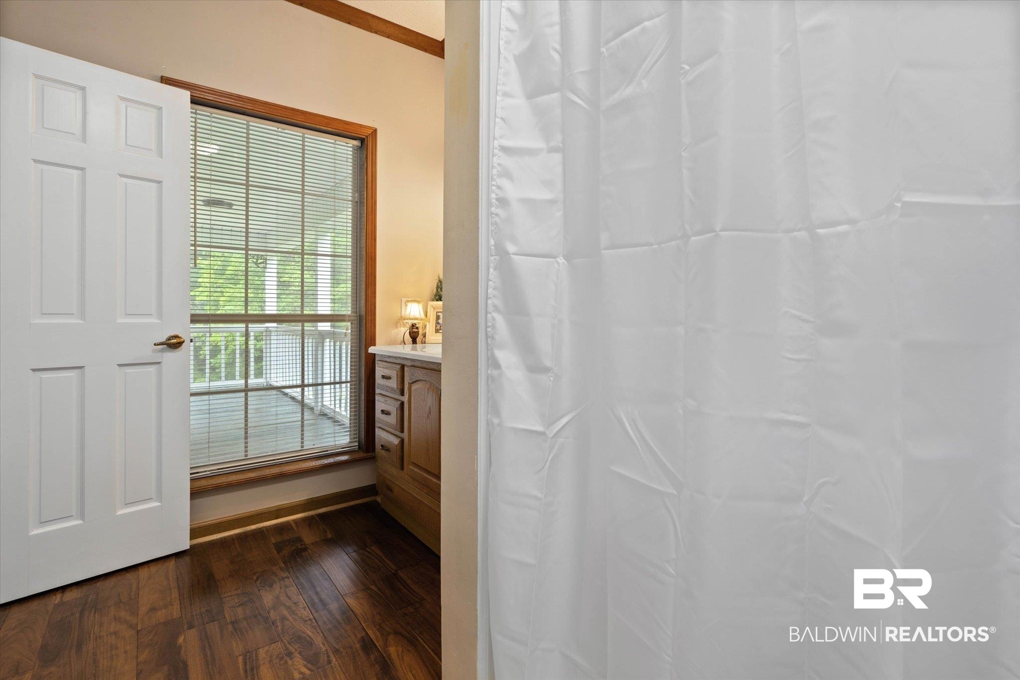 2300 Radcliff Road Saraland, AL 36571 - Photo 16 of 56 Bathroom with wood finished floors and vanity