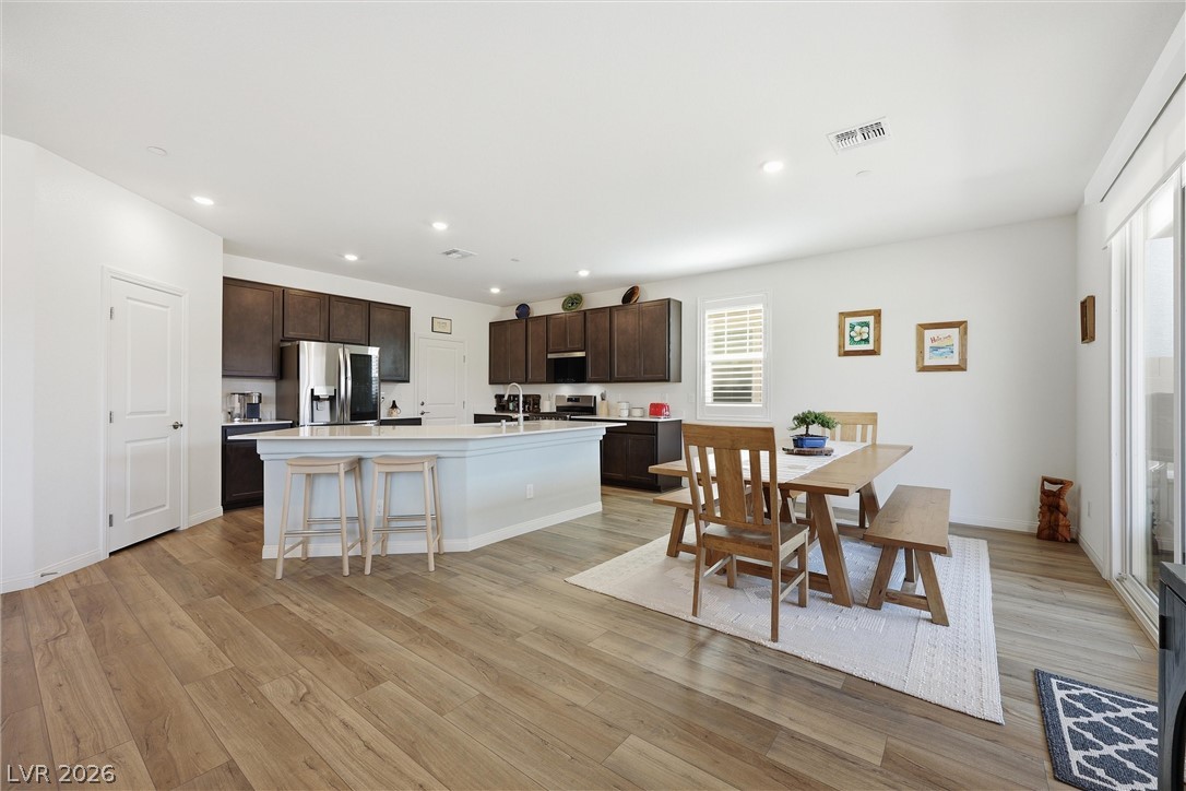 3705 Alla Rocca Avenue Henderson, NV 89044 - Photo 12 of 50 This spacious kitchen and dining area features abundant natural light.