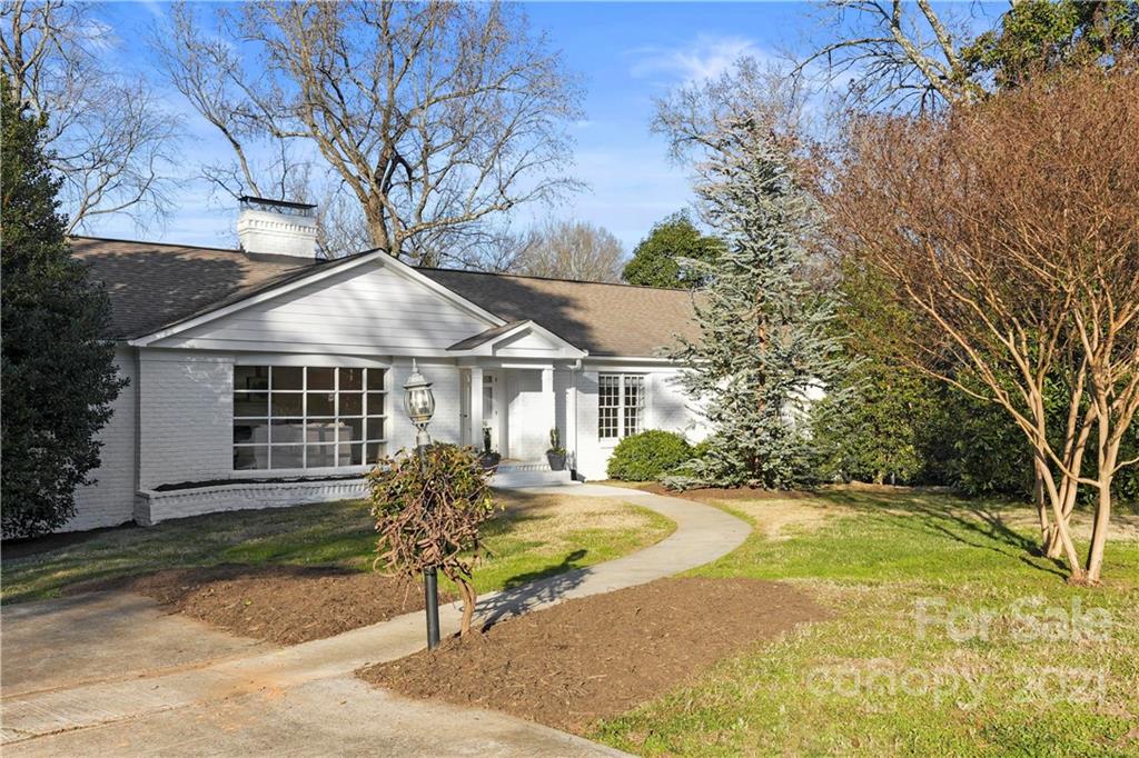 2326 Ferncliff Road Charlotte, NC 28211 - Photo 1 of 48 a front view of a house with garden