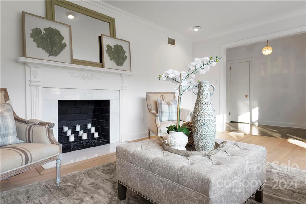 2326 Ferncliff Road Charlotte, NC 28211 - Photo 12 of 48 a living room with furniture and a fireplace