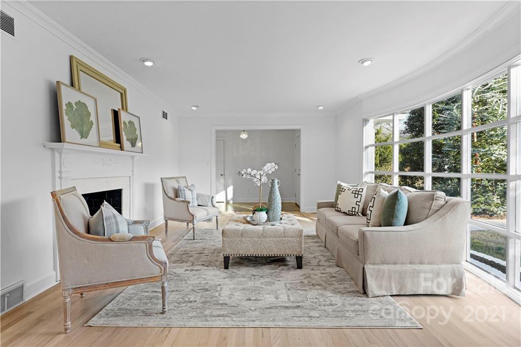 2326 Ferncliff Road Charlotte, NC 28211 - Photo 13 of 48 a living room with furniture and a fireplace