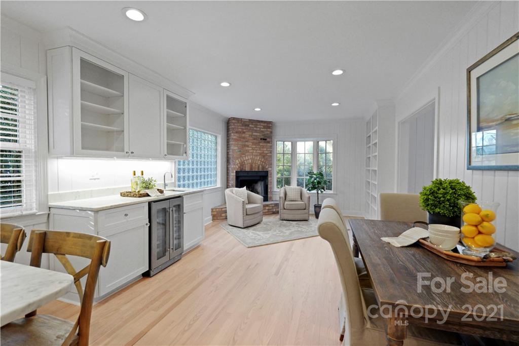 2326 Ferncliff Road Charlotte, NC 28211 - Photo 18 of 48 a view of a dining room with furniture window and wooden floor
