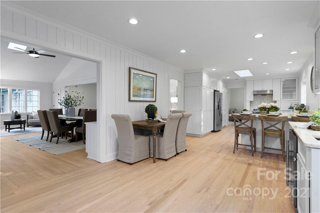 2326 Ferncliff Road Charlotte, NC 28211 - Photo 22 of 48 a view of a dining room with furniture window and wooden floor