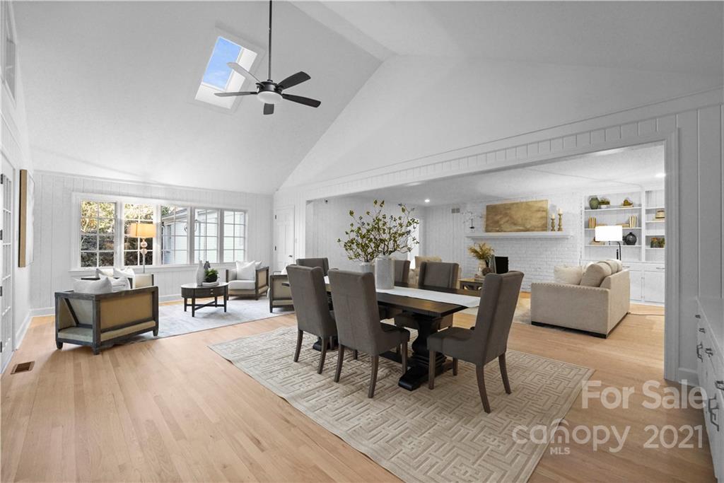 2326 Ferncliff Road Charlotte, NC 28211 - Photo 23 of 48 a dining room with furniture and wooden floor