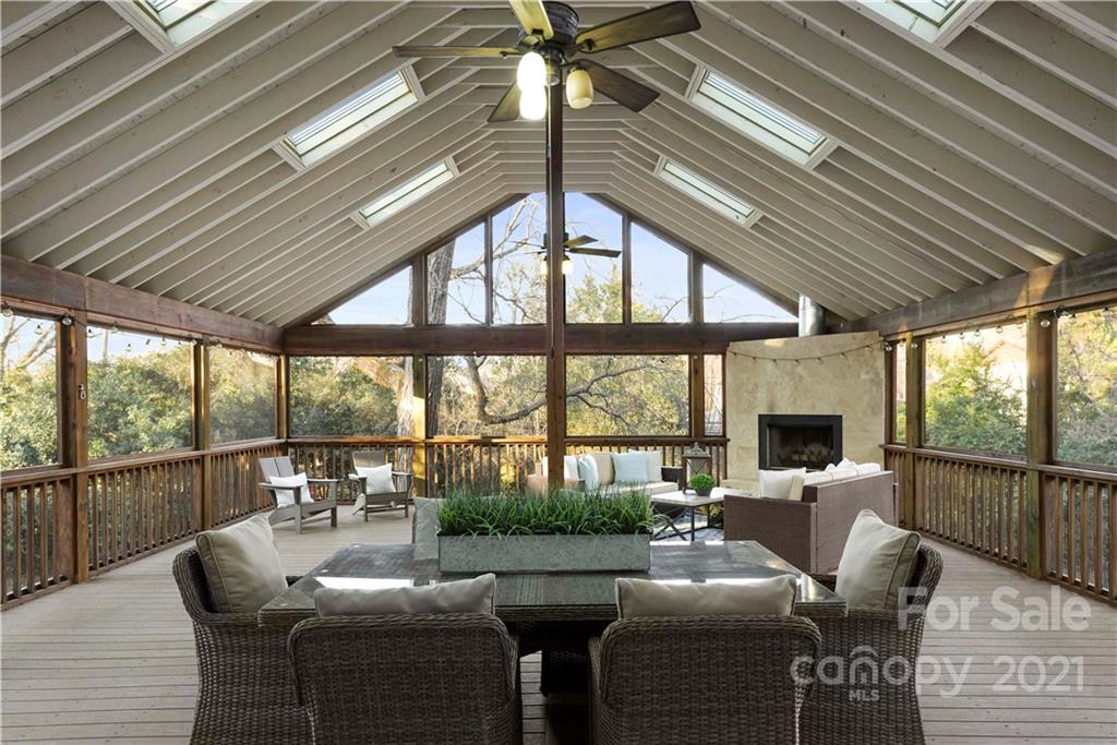 2326 Ferncliff Road Charlotte, NC 28211 - Photo 3 of 48 a living room with furniture and a floor to ceiling window