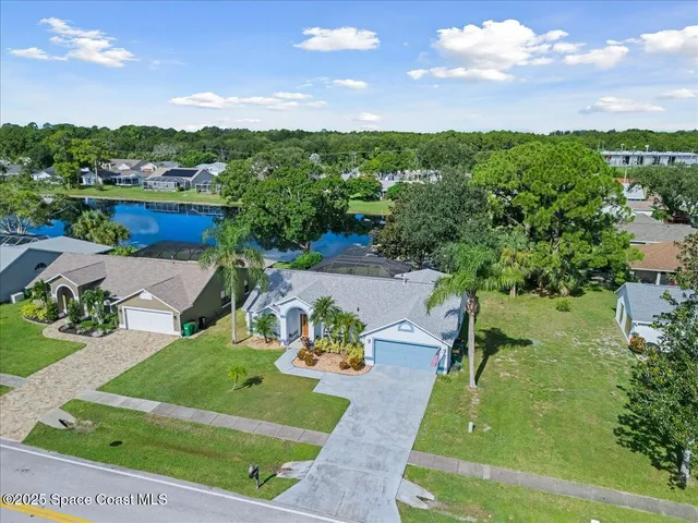 a view of a garden with houses