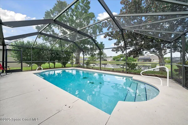 a view of outdoor space with swimming pool