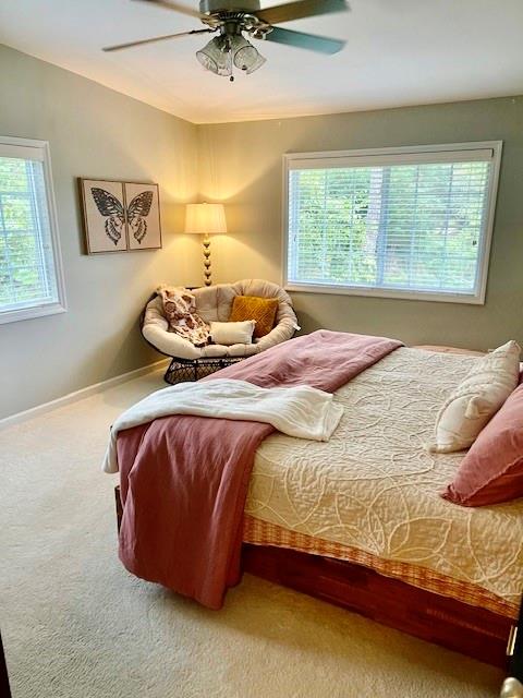 1468 Briarwood Road Northeast, Unit 1008 Atlanta, GA 30319 - Photo 17 of 44 a bedroom with a bed and painting on the wall