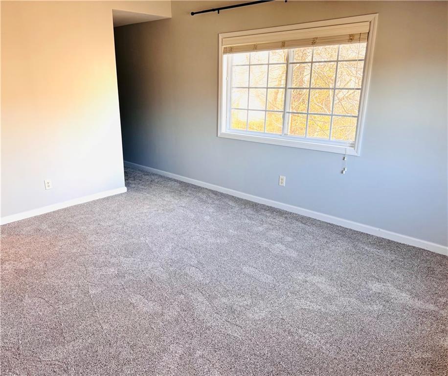1468 Briarwood Road Northeast, Unit 1008 Atlanta, GA 30319 - Photo 20 of 44 an empty room with a window