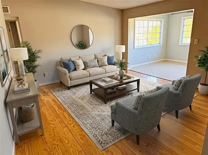 a living room with furniture and a window