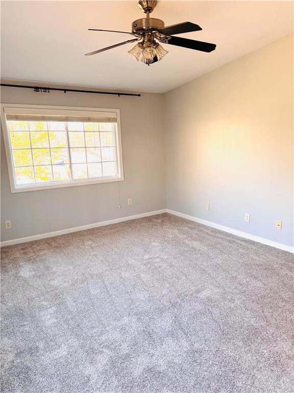 1468 Briarwood Road Northeast, Unit 1008 Atlanta, GA 30319 - Photo 23 of 44 an empty room with windows