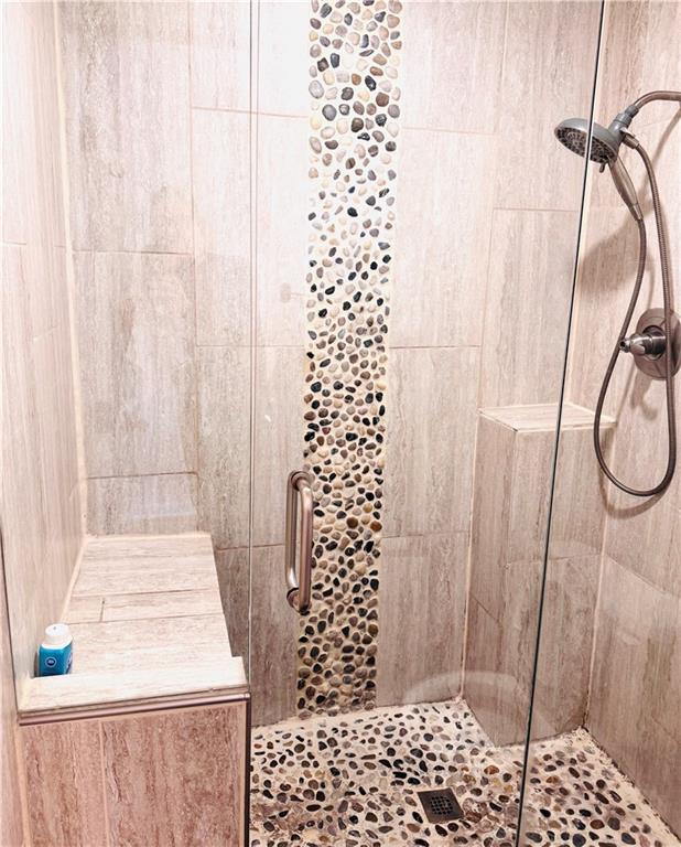 1468 Briarwood Road Northeast, Unit 1008 Atlanta, GA 30319 - Photo 27 of 44 a bathroom with a shower