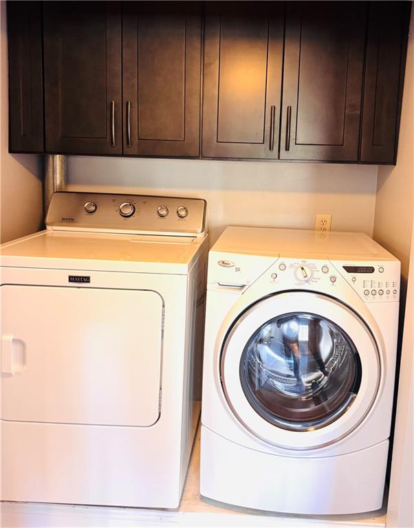 1468 Briarwood Road Northeast, Unit 1008 Atlanta, GA 30319 - Photo 31 of 44 a utility room with dryer and washer