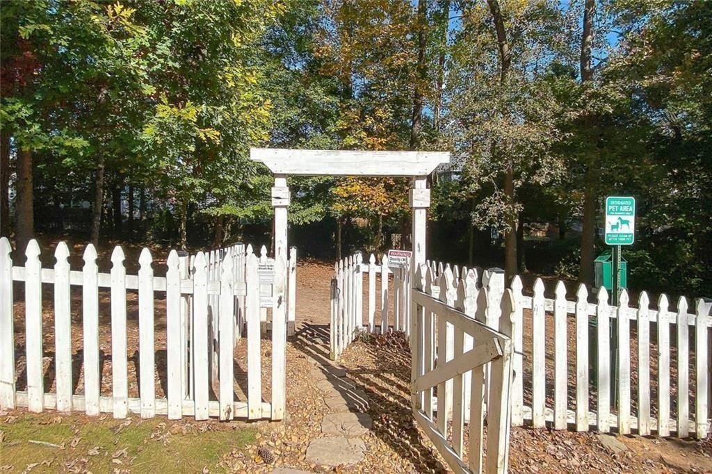 1468 Briarwood Road Northeast, Unit 1008 Atlanta, GA 30319 - Photo 36 of 44 a view of wooden fence