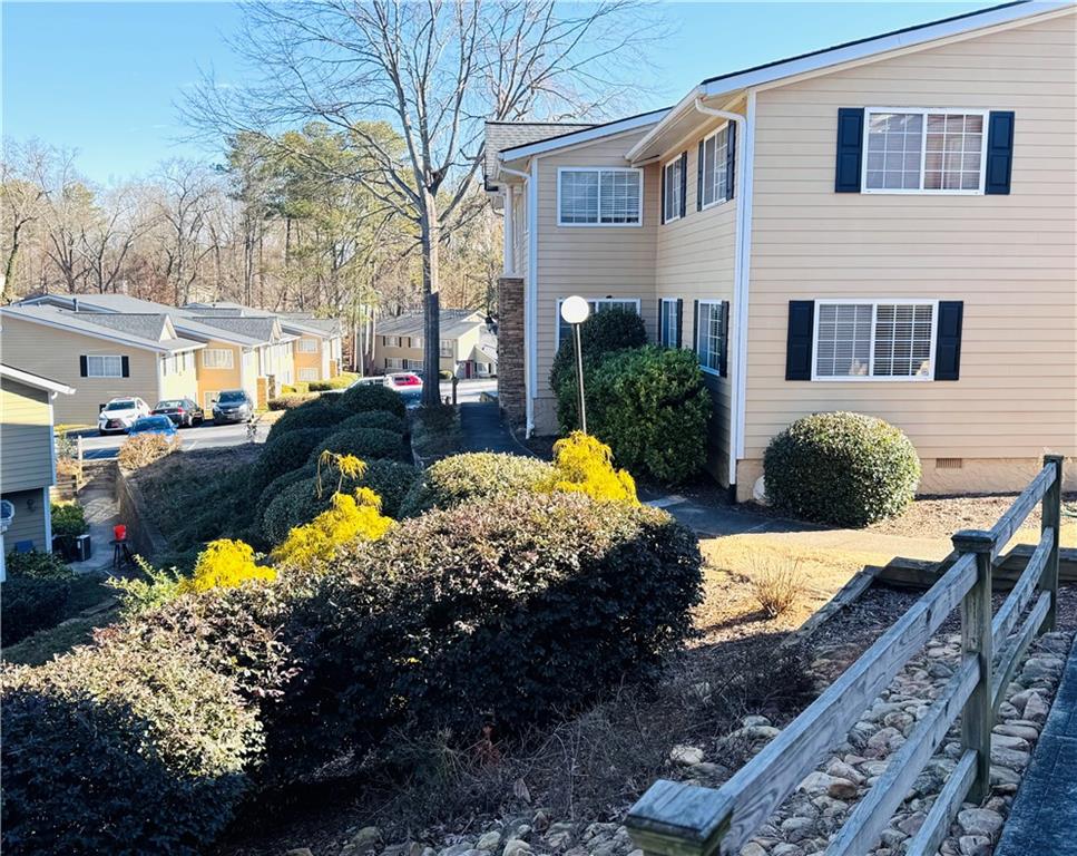1468 Briarwood Road Northeast, Unit 1008 Atlanta, GA 30319 - Photo 39 of 44 a view of a yard with a house