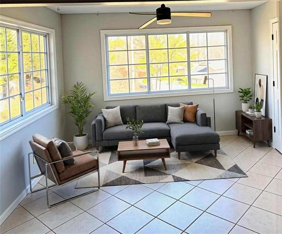 1468 Briarwood Road Northeast, Unit 1008 Atlanta, GA 30319 - Photo 4 of 44 a living room with furniture and a window