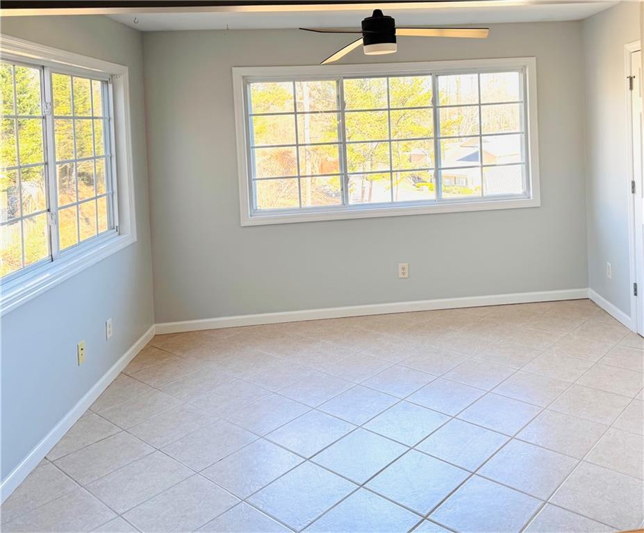 1468 Briarwood Road Northeast, Unit 1008 Atlanta, GA 30319 - Photo 5 of 44 an empty room with a window