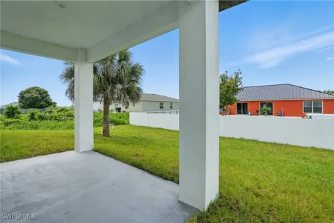 a house with a tree in front of it