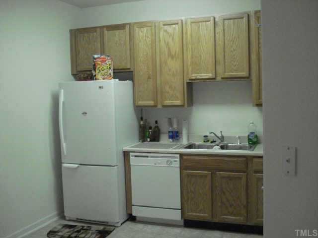 8620-105 Neuse Club Lane Raleigh, NC 27616 - Photo 3 of 6 Nice size kitchen with lots of cabinet space.