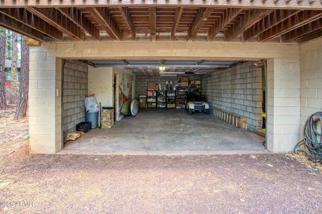 a view of a garage with chairs