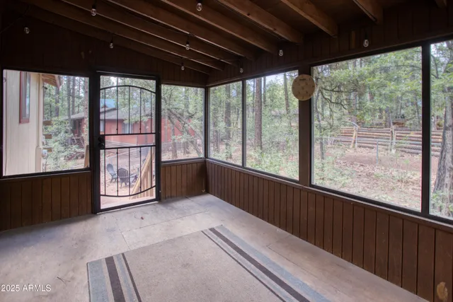 a view of a room with a large window