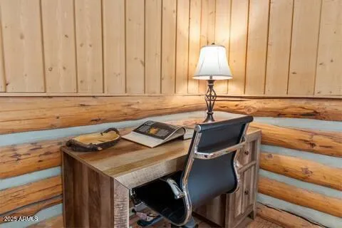 a view of a room with furniture and chandelier