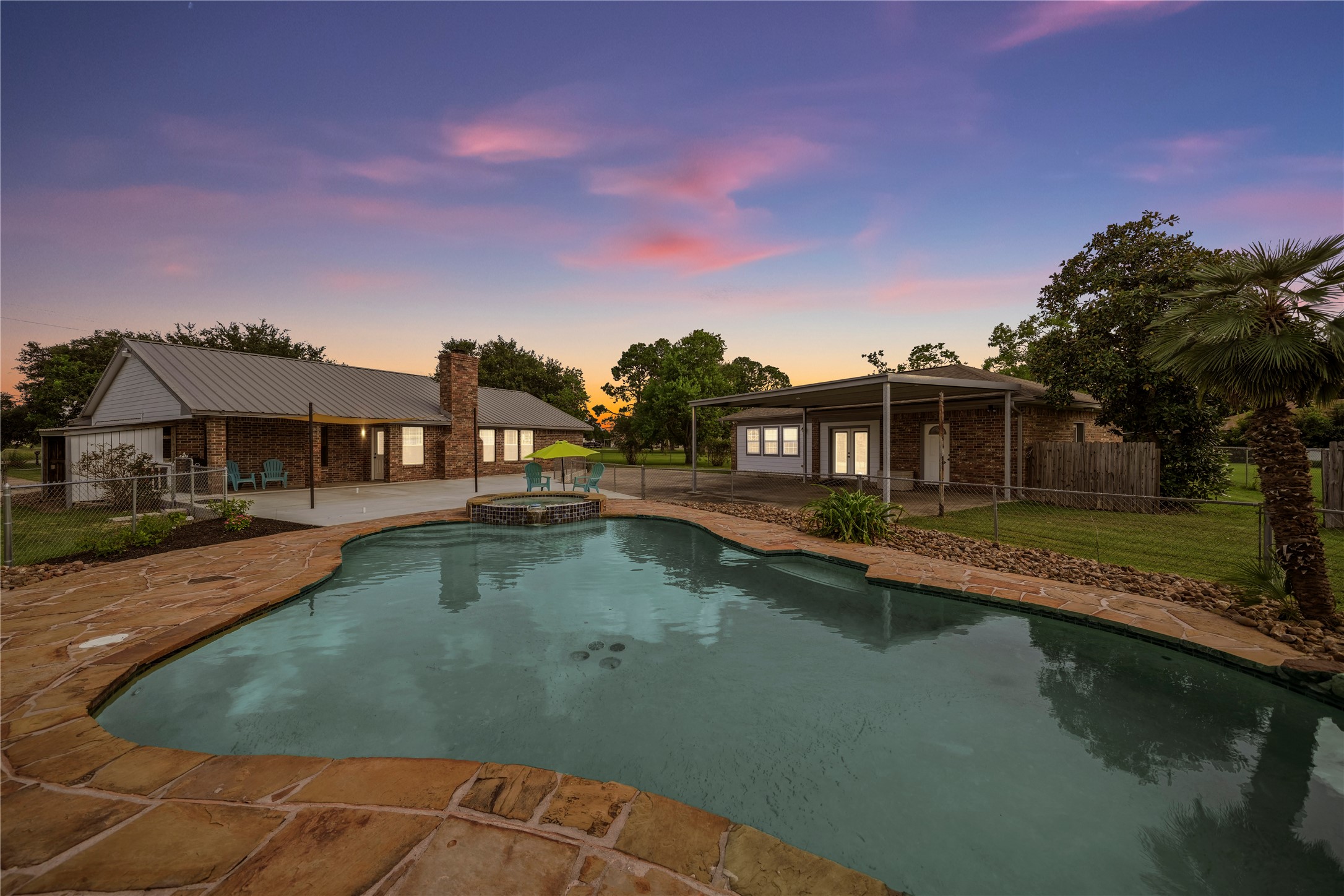4435 South Tower Road Santa Fe, TX 77517 - Photo 23 of 35 No need to chase the sunset, enjoy it from your own backyard oasis.