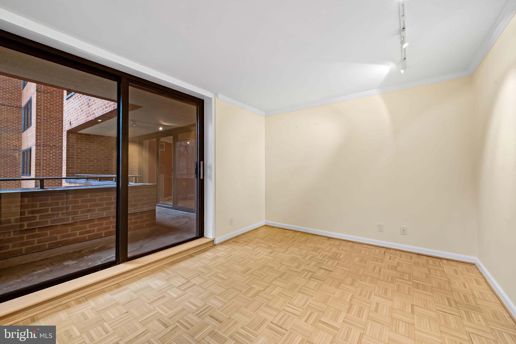 111 Hamlet Hill Road, Unit 406 Baltimore, MD 21210 - Photo 22 of 37 3rd bedroom/den with balcony access