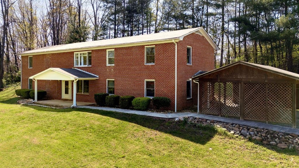 2051 Mt Torrey Road Lyndhurst, VA 22952 - Photo 1 of 67 a front view of a house with a yard