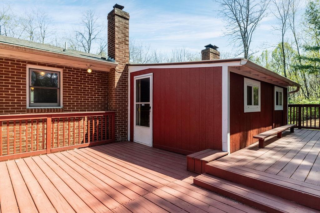 2051 Mt Torrey Road Lyndhurst, VA 22952 - Photo 13 of 67 a backyard of a house with wooden floor