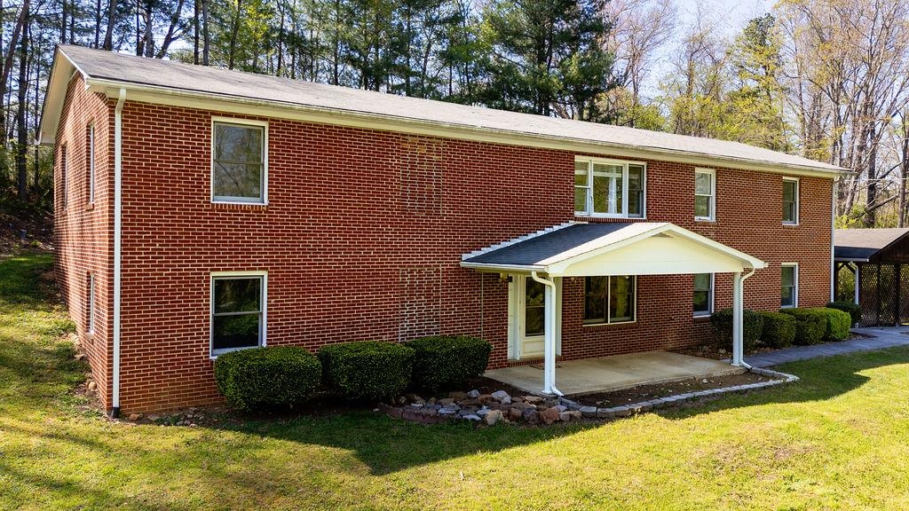 2051 Mt Torrey Road Lyndhurst, VA 22952 - Photo 2 of 67 a backyard of a house with yard and outdoor seating