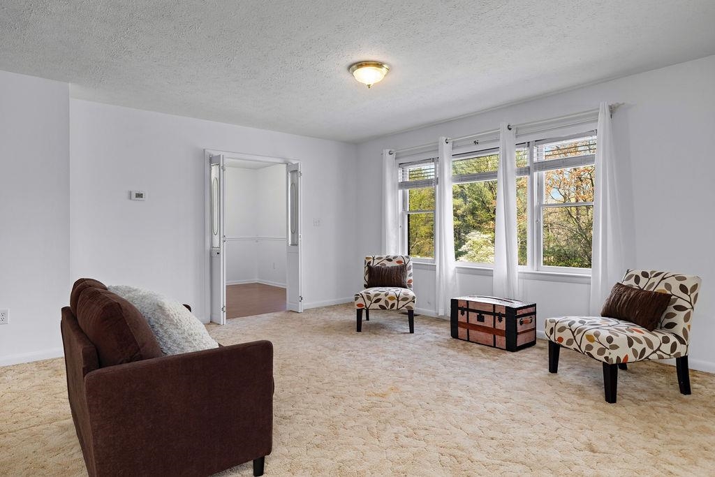 2051 Mt Torrey Road Lyndhurst, VA 22952 - Photo 21 of 67 a living room with furniture and a window