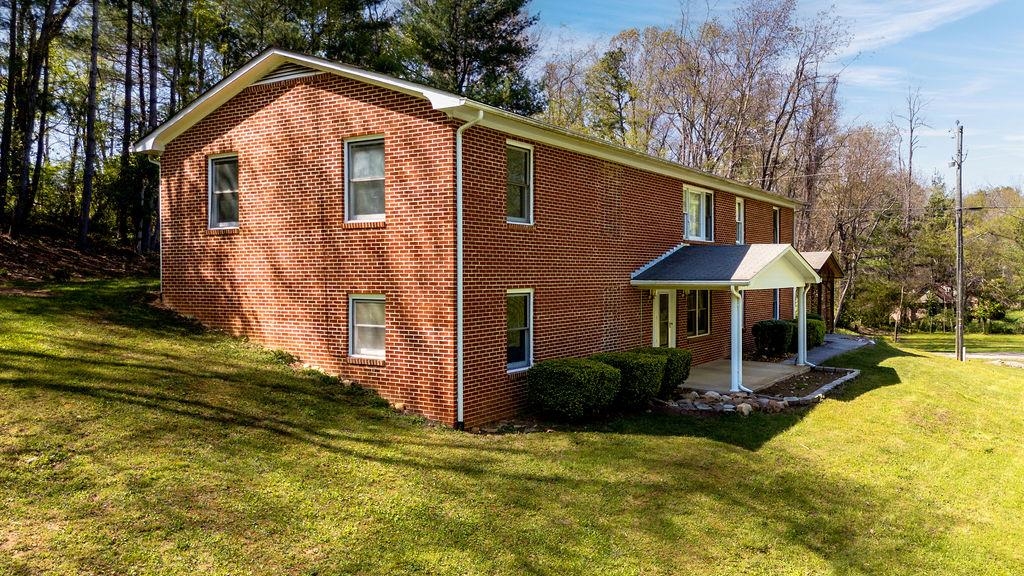 2051 Mt Torrey Road Lyndhurst, VA 22952 - Photo 3 of 67 a front view of a house with garden