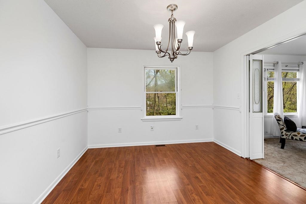 2051 Mt Torrey Road Lyndhurst, VA 22952 - Photo 34 of 67 wooden floor in an empty room with a window