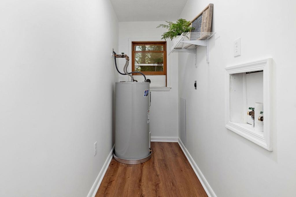 2051 Mt Torrey Road Lyndhurst, VA 22952 - Photo 49 of 67 a view of a hallway with wooden floor and a potted plant