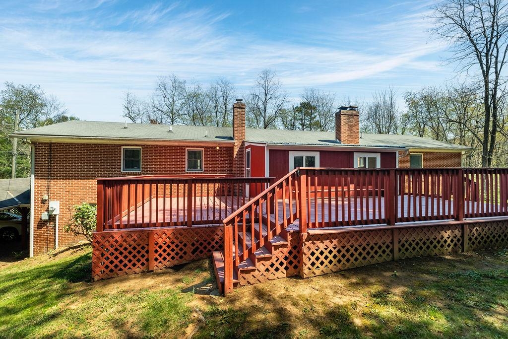 2051 Mt Torrey Road Lyndhurst, VA 22952 - Photo 9 of 67 a view of a roof deck with wooden fence and floor