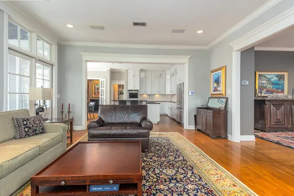 a kitchen with stainless steel appliances a refrigerator stove microwave and sink