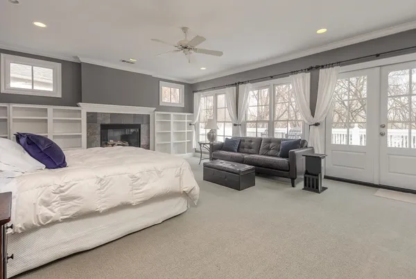 a view of room with window and wooden floor