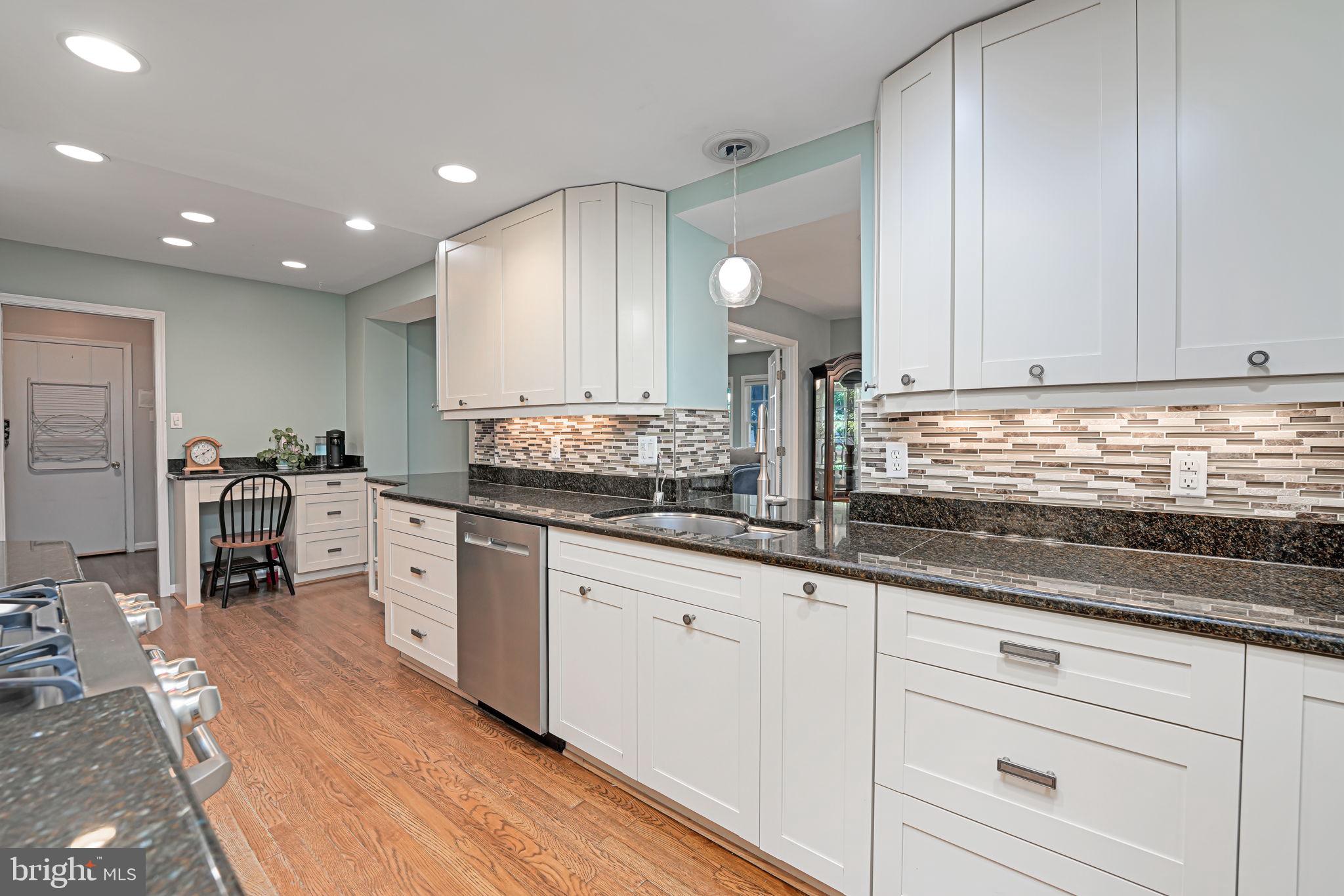 1708 Burning Tree Drive Vienna, VA 22182 - Photo 12 of 57 Pass through window to dining room