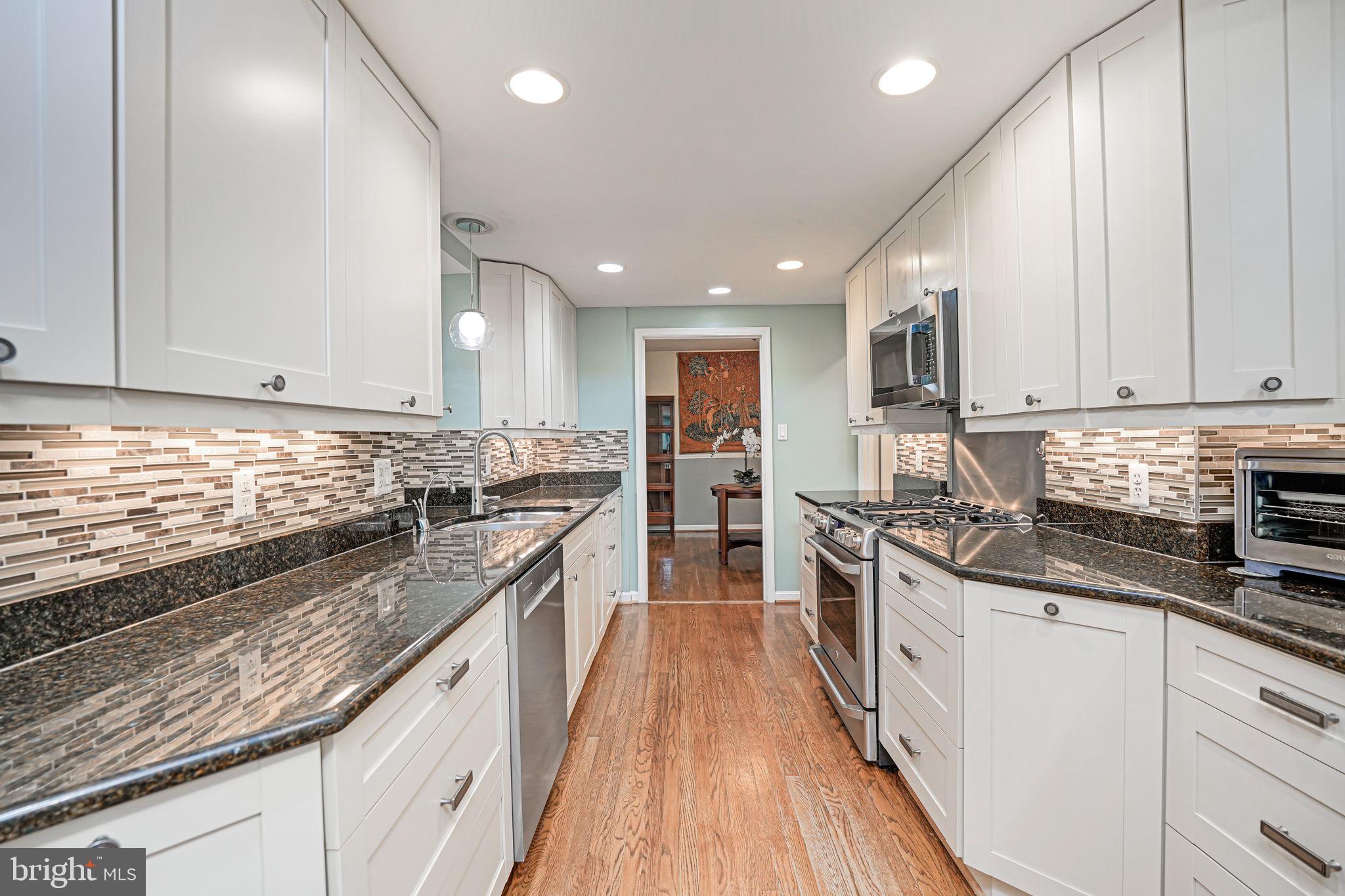 1708 Burning Tree Drive Vienna, VA 22182 - Photo 13 of 57 Gas stove with built-in microwave