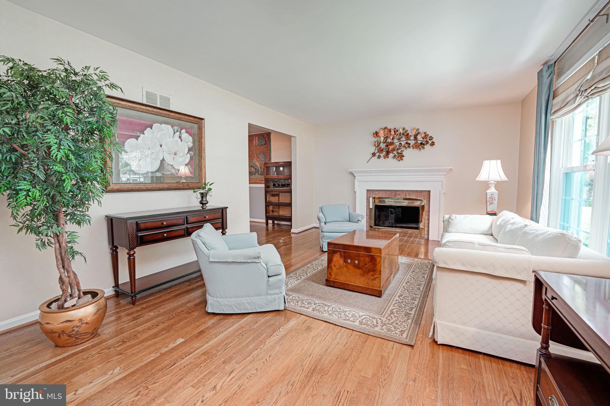 1708 Burning Tree Drive Vienna, VA 22182 - Photo 4 of 57 Living room with wood burning fireplace