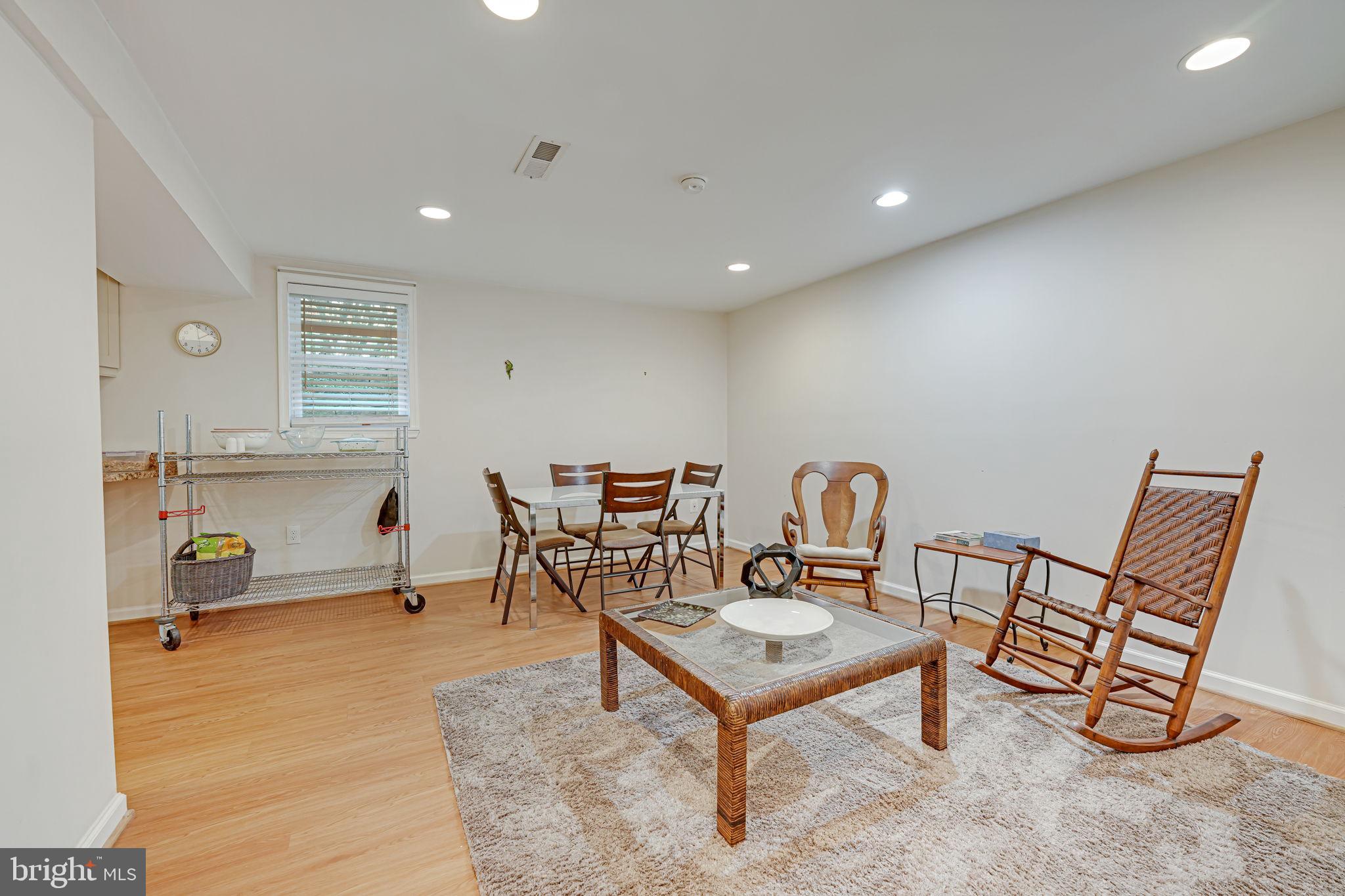 1708 Burning Tree Drive Vienna, VA 22182 - Photo 49 of 57 Lower level living/dining room