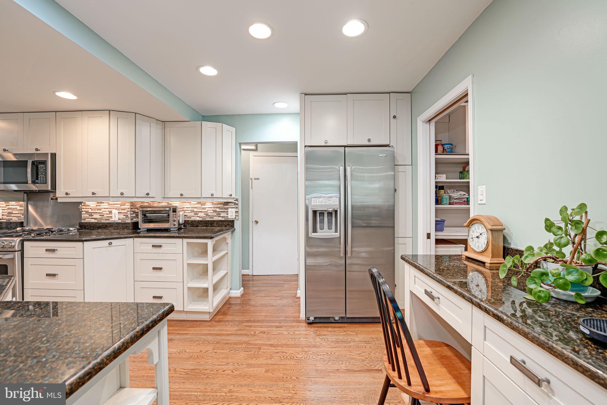 1708 Burning Tree Drive Vienna, VA 22182 - Photo 10 of 57 Stainless steel appliances kitchen office space