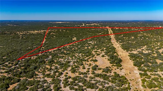 a view of city with ocean