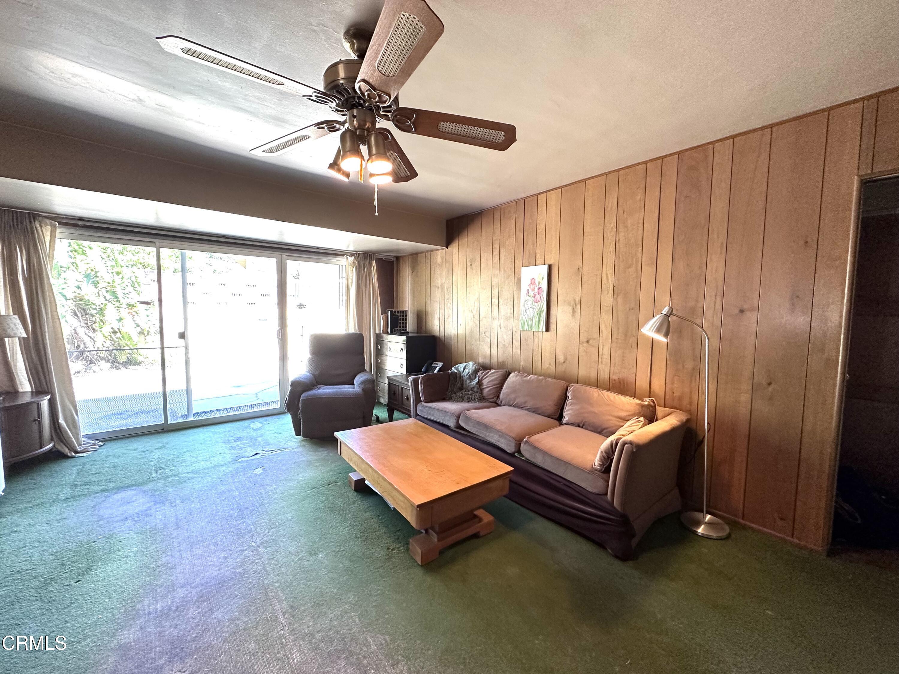 3895 Mayfair Drive Pasadena, CA 91107 - Photo 11 of 18 a living room with furniture and a large window